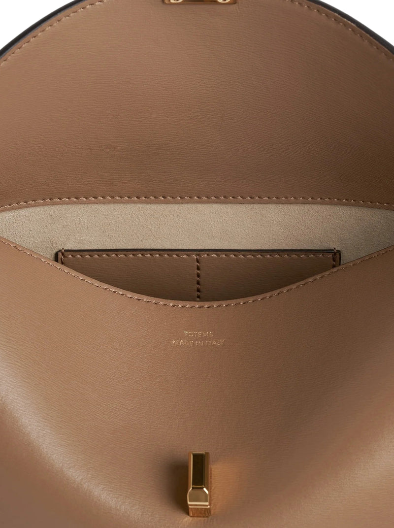 T-LOCK LEATHER CLUTCH