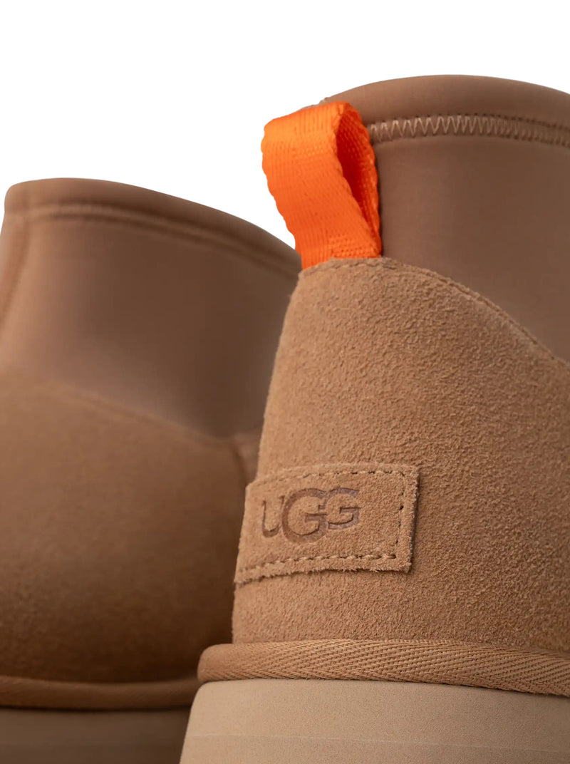 CLASSIC MINI DIPPER ANKLE BOOTS