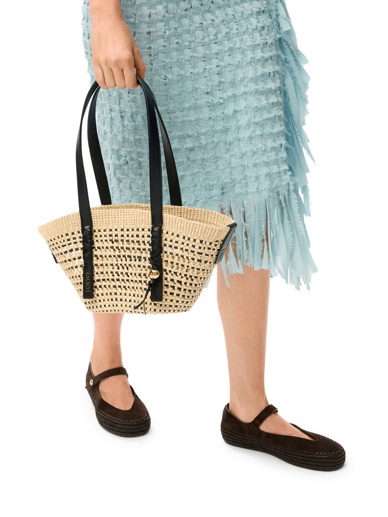 SMALL WOVEN BASKET MADE OF IRACA PALM AND CALFSKIN
