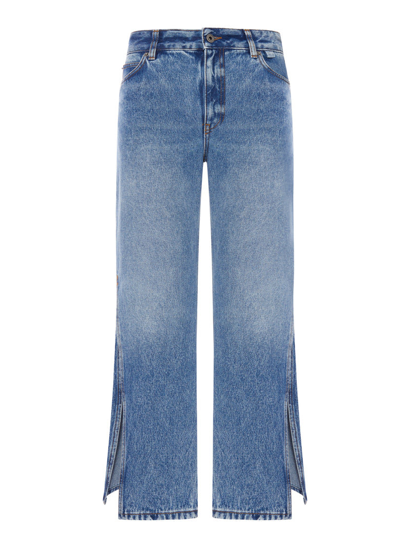 DENIM TROUSERS WITH FLARED LEG AND SIDE SLITS