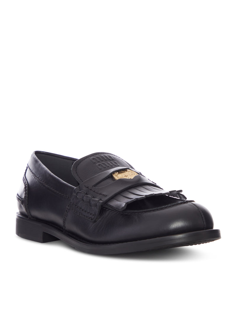 LEATHER MOCCASIN WITH FRINGES AND LOGO DETAIL