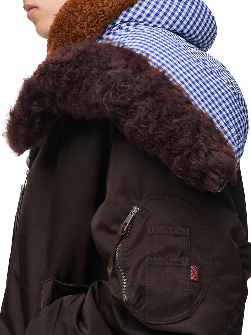 TECHNICAL COATING BOMBER JACKET WITH DOUBLE LAYER CONSTRUCTION AND CHECKED BACK