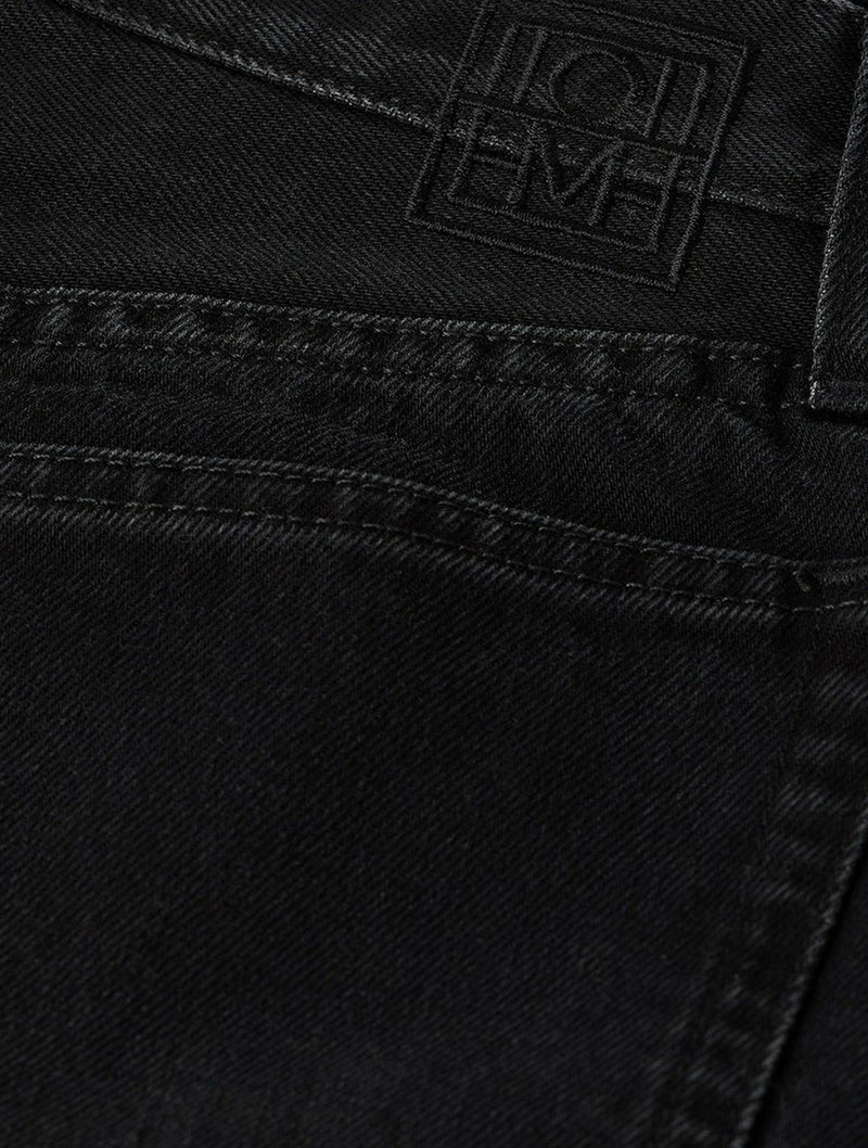 Twisted seam denim full length faded black