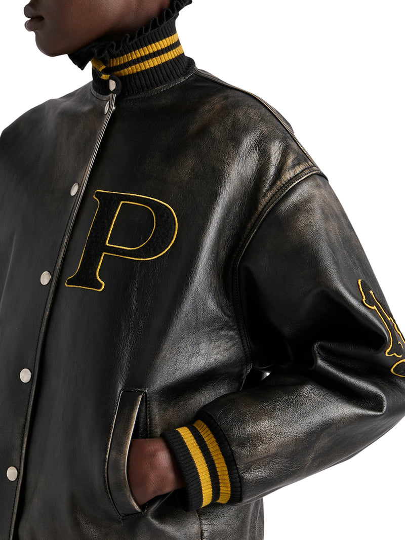 Leather bomber with patch