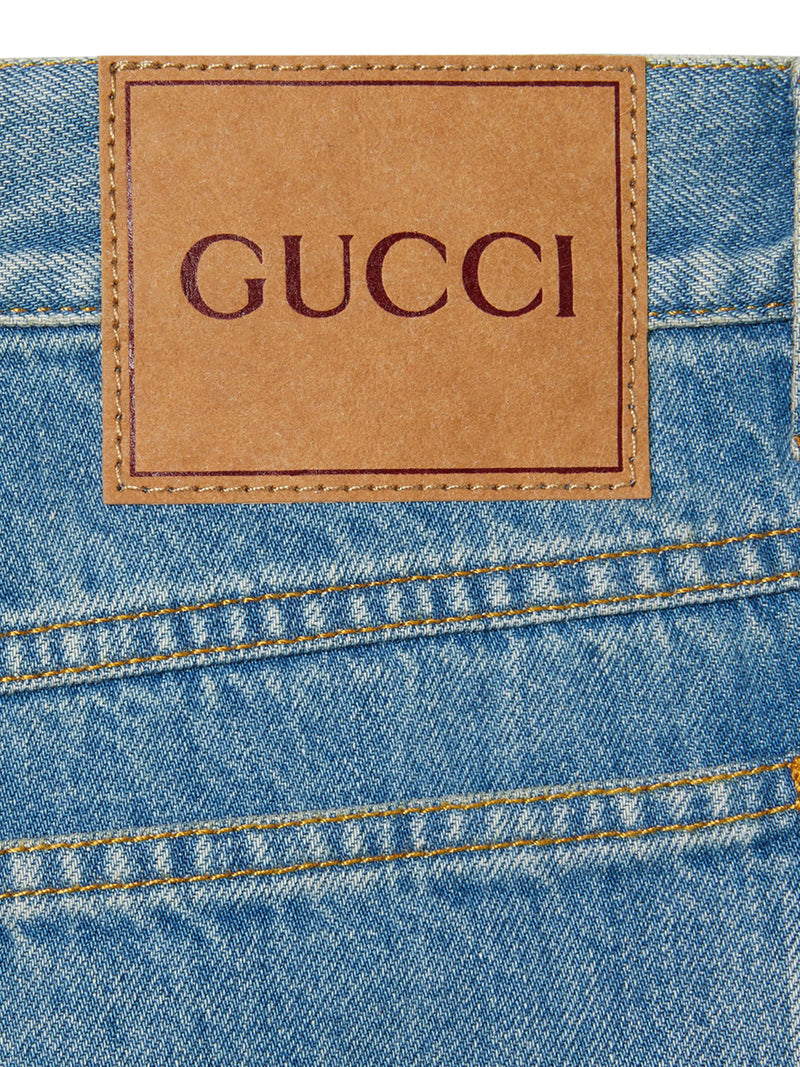 DENIM PANTS WITH LASER-CUT DOUBLE G