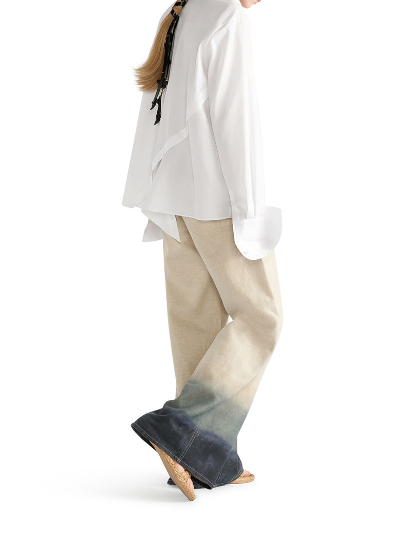 BLOUSE WITH OBLIQUE CLOSURE