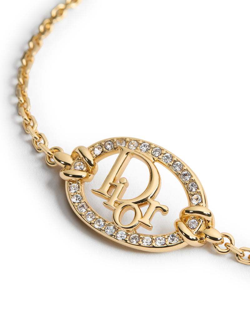 OBLIQUE METAL BRACELET WITH GOLD FINISH AND CRYSTALS