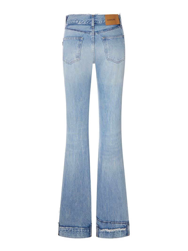 HIGH-WAISTED FLARE JEANS IN USED DENIM WITH DECORATED HEM