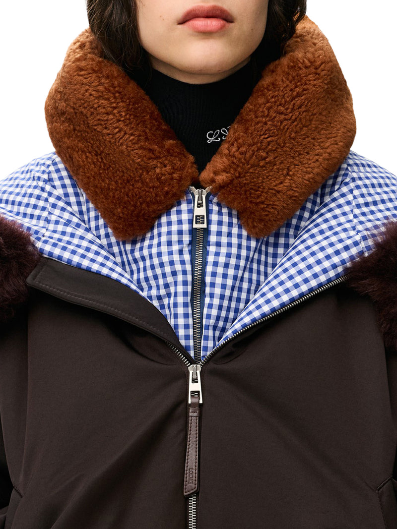 TECHNICAL COATING BOMBER JACKET WITH DOUBLE LAYER CONSTRUCTION AND CHECKED BACK