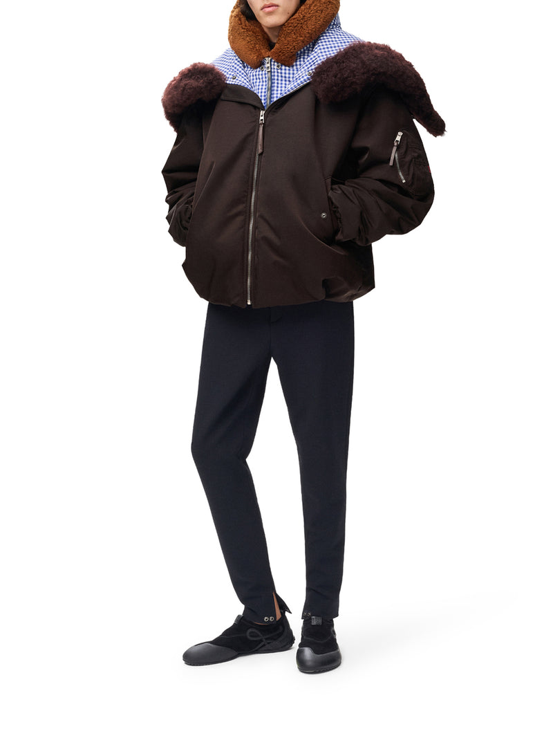 TECHNICAL COATING BOMBER JACKET WITH DOUBLE LAYER CONSTRUCTION AND CHECKED BACK