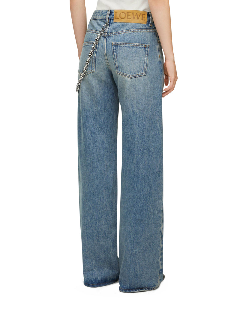 Jeans with denim chain